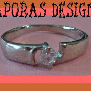 Size 8 Silver Tone Ring With Clear Crystal